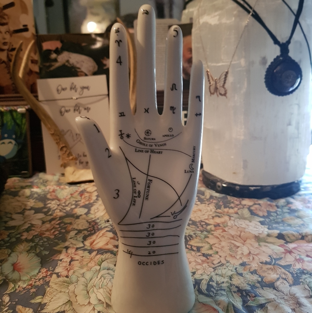 ceramic palm readers statue
